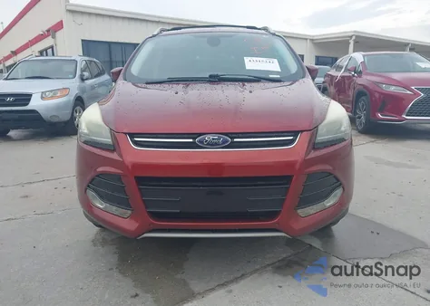 2014 Ford Escape Titanium z USA, uszkodzony, nr VIN 1FMCU0J9XEUA89585
